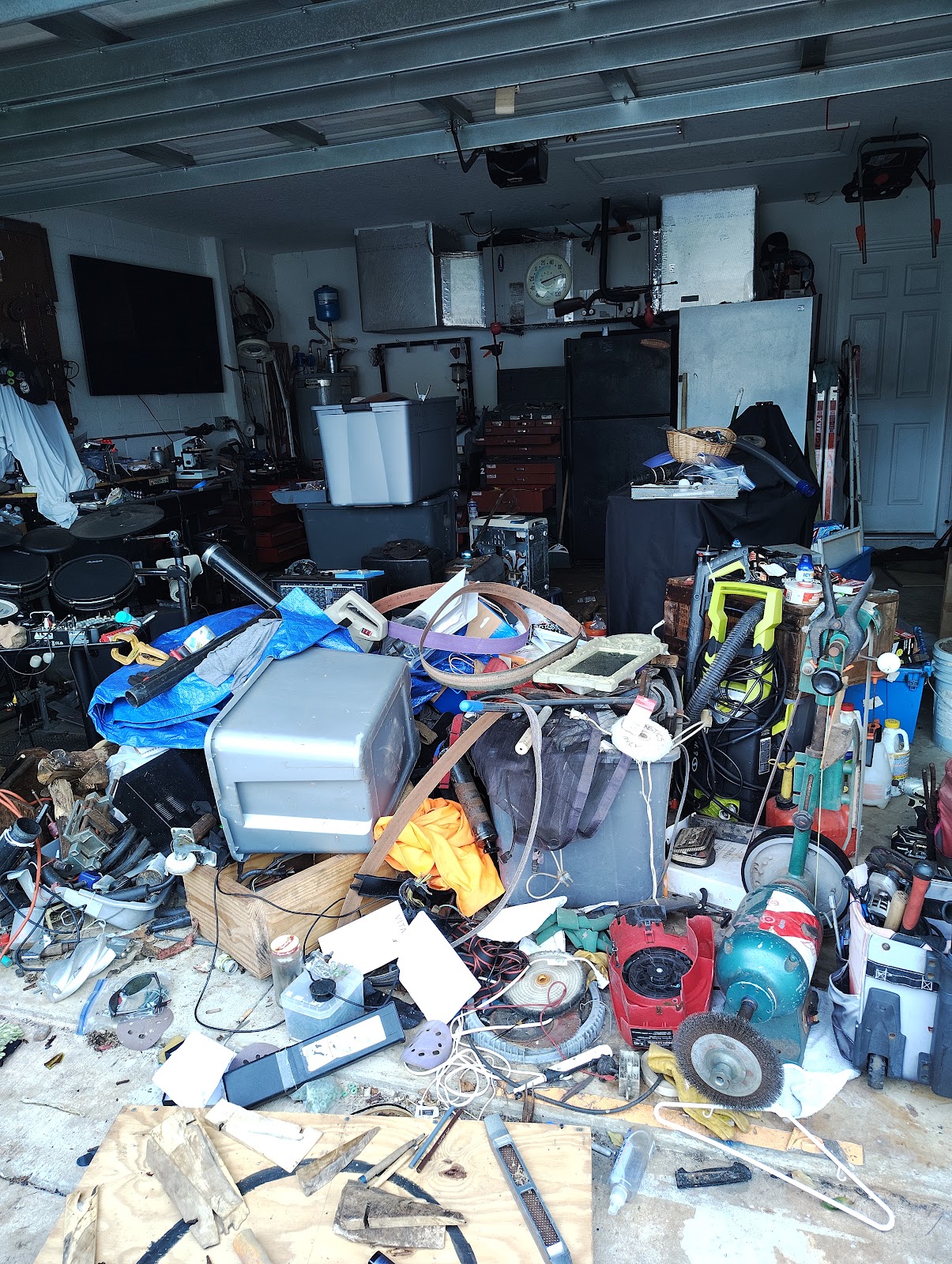 Cluttered garage before